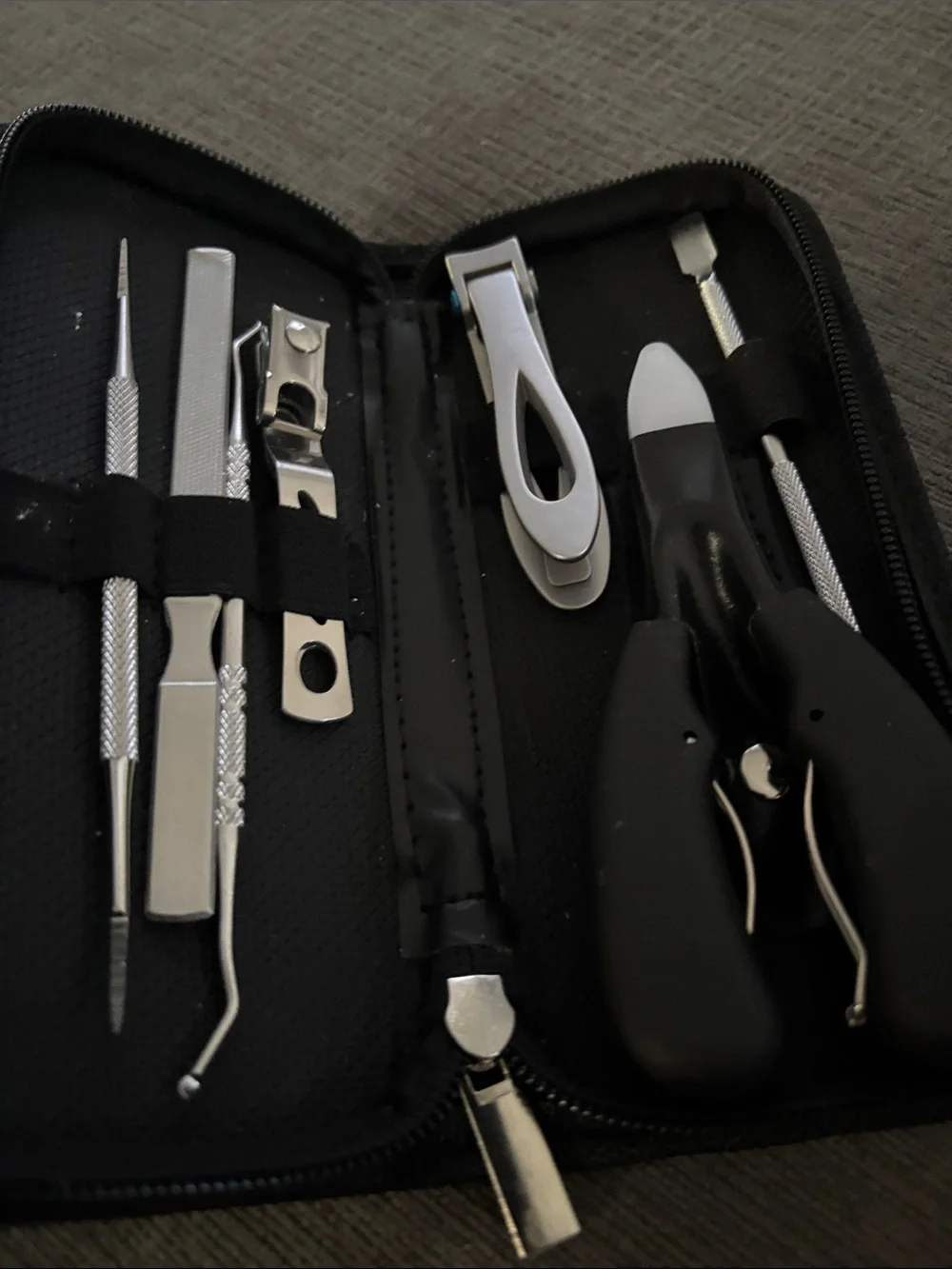 Black Zippered Travel Tool Pouch for toenails.